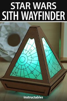 the star wars sith wayfinder is made out of cardboard and has a light inside