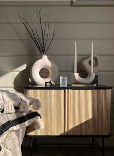 Bring your room to life with this modern minimalist white halo vase. This ceramic vase is versatile and can be filled with water for fresh flowers, used for dried pampas grass, eucalyptus or other dried floral arrangements. The design is simple, inspired by our everyday snack, a donut with the intention of making a fun yet elegant decor. - Interior decoration, flower vase, interior pieces, luxurious decoration, architectural digest, zara home, hm home Living Room Designs India