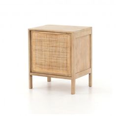 the side table is made out of wood and has a rattan pattern on it