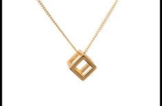 Unlock a world of elegance with this captivating gold cube pendant, meticulously crafted from premium 316L stainless steel and bathed in opulent 18K gold plating. Its flawless surface radiates warmth and luxury, inviting admiration with every glance. The geometric perfection of the cube design exudes modern sophistication, while the luminous gold finish adds a touch of timeless allure. Whether worn as a symbol of intellect, creativity, or simply as a statement of style, this pendant is a versati Cube Necklace, Cube Design, Gold Finish, Charm Necklace, Jewelry Collection, Jewelry Necklace Pendant, Plating, Stainless Steel, Bathing Beauties