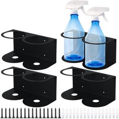 four plastic bottles with sprayers on the top and two black holders below each one