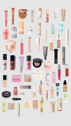 an assortment of cosmetics and makeup products arranged in the shape of a circle on a white background