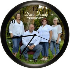 a family photo on a black clock with stars