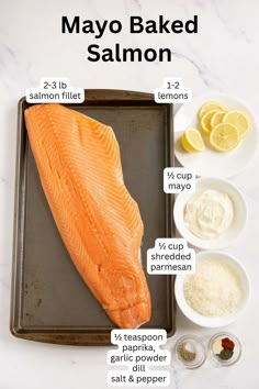 the ingredients to make mayo baked salmon on a baking sheet