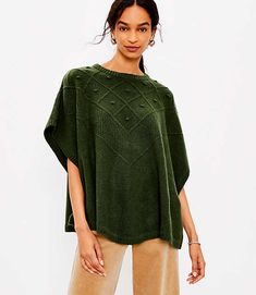 Drape everyday outfits in a cozy kind of city chic with this luxe bobbled poncho sweater. Loft Bobble Poncho Sweater Size XL/ XXL Olive Leaf Women's by Loft Size Regular - XL/ XXL Olive Leaf Women's Ponchos, &, Wraps, Gifts, 57%, Acrylic, 40%, Nylon, 3%, Wool, Machine, Washable Ladies Poncho, Olive Leaf, Poncho Sweater, City Chic, Ponchos, Everyday Outfits, Effortless Style, Sweater Sizes, Tunic Tops