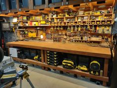 the workbench is full of tools and other things to do with it,