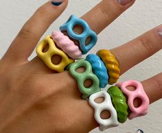 Our Chunky Enamel Rings come in a variety of colors and sizes, making it easy to mix and match with your favorite outfits.  Made with high-quality metal and enamel are designed to be both durable and comfortable. The adjustable band ensures a perfect fit, making them a great choice for anyone who struggles to find rings that fit comfortably. Whether you're looking for a bold pop of color or a subtle accent, our Rings have got you covered. The vibrant colors and trendy design make them an instant statement piece that can easily elevate any outfit. These rings are especially popular among teens and young adults who are looking for unique and colorful jewelry that they can wear every day. Enamel Rings, Engagement Ring Diamond Cut, Geometric Ring, Moissanite Wedding Rings, Crystal Stars, Colorful Jewelry, Modern Ring, Star Jewelry, Enamel Ring