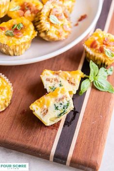 mini quiche cups on a wooden cutting board