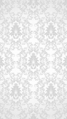 a white and gray floral wallpaper pattern