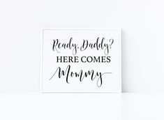 a black and white sign that says ready daddy here comes mommy