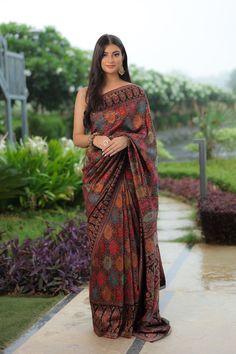 Black Kani saree is crafted in silk fabric and is accentuated all over with Kani Jamawar weaving  in traditional motifs like paisleys and flowers in gorgeous colours. A touch of zari is woven into the threads to add a hint of shine and to the royalty of this gorgeous saree. It comes with a blouse piece in same colour that has Kani weaving in booti pattern.  The design inspiration for this Pashmina Silk saree is drawn from the heritage weaves of ancient Pashmina shawls from Kashmir that date back Luxury Pashmina Traditional Wear For Ceremonies, Luxury Tussar Silk Shawl In Bollywood Style, Multicolor Silk Pre-draped Saree With Zari Work, Elegant Semi-stitched Multicolor Pre-draped Saree, Bollywood Style Festive Pre-draped Saree With Kalamkari Print, Navratri Meenakari Tussar Silk Pre-draped Saree, Silk Pre-draped Saree For Navratri Designer Wear, Designer Multicolor Tussar Silk Pre-draped Saree, Navratri Katan Silk Pre-draped Saree With Meenakari