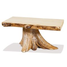 a wooden bench made out of wood with a tree trunk on it's side