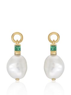 The Fleur pearl earrings are a modern take on pearl drop earrings, set with emerald green stones and featuring hoop stud detail. These baroque pearls give a contemporary take on a classic design and offer great versatility to your jewellery box. Made from 18 carat gold vermeil, baroque pearls and emerald green cubic zirconia. Please note as these earrings contain natural baroque pearls, the shape may differ slightly to those shown in the images provided. Height: Approx. 21mm. Width: Approx 8.5mm. Material: 18ct Gold Vermeil. Stone type and amount: Baroque Pearl & Emerald Green Cubic Zironia. Emerald And Pearl Earrings, Green Emerald Earrings With Pearl Drop, Luxury Traditional Green Pearl Earrings, Luxury Green Pearl Drop Earrings, Luxury Green Pearl Earrings, Elegant Style, Emerald Green Stone, Cap Fashion, Spring Makeup, Green Stone