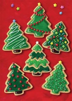 decorated cookies with christmas trees on them