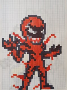 a piece of paper with an image of a red and black character in pixel art