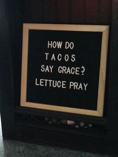 a sign that says how do tacos say grace? lettuce pray on it