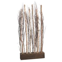 a tall wooden planter filled with lots of branches