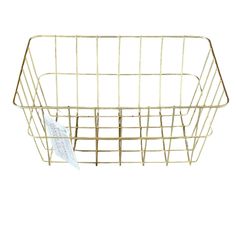 a gold wire basket with a tag on it