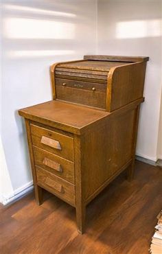 an old wooden desk with two drawers