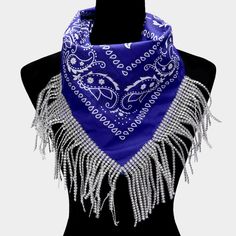 a blue bandana with silver fringes on it