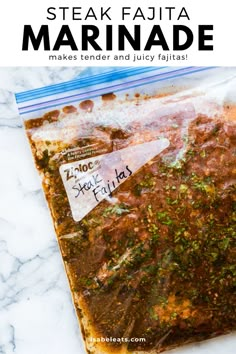 steak fajita marinade in a plastic bag on top of a marble counter