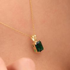 14K Gold Plated Rectangle Emerald Necklace, Elegant Minimalist Jewelry, 925 Sterling Silver Emerald Baguette Pendant, Perfect Gift for Women Discover the allure of our Rectangle Emerald Necklace a piece of custom jewelry that blends elegance with simplicity. This necklace features a striking rectangular emerald pendant, perfect for adding a touch of sophistication to any outfit. Ideal as a gift for her on special occasions like birthdays, anniversaries, or holidays, its minimalist design ensures it stands out while remaining timeless. Handcrafted with precision, this necklace is not only stylish but also a meaningful accessory. Perfect for those who appreciate unique and elegant jewelry. Chain Length Options 14 inches (35 cm): Ideal for children aged 5 and under (Choker Size). This length Emerald Necklace Gold, Baguette Pendant, Green Pendant Necklace, Dainty Rose, Green Pendant, Green Pendants, Necklace Elegant, Jewelry Chain, Emerald Pendant