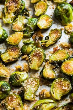 roasted brussel sprouts with parmesan cheese and seasoning on top