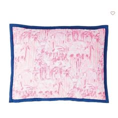 a pink and blue square pillow on a white background with the word love written across it