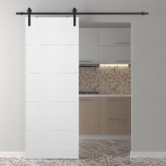 an open sliding door in a kitchen with tile flooring and white walls, showing the interior