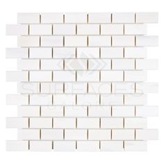 A white rectangular tile pattern arranged in a horizontal brick-like design, with each row slightly offset from the one above and below it. The glossy tiles, part of SurfacesGalore's Bianco Dolomite (White Dolomite) 1X2 Brick Mosaic Marble Polished-Honed collection, offer a smooth, reflective surface reminiscent of Bianco Dolomiti Marble. Brick Mosaic, Mosaic Marble, Marble Polishing, Pure Elegance, Marble Tiles, Traditional Interior, White Marble, White Background, Mosaic