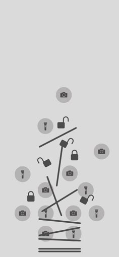 an image of various tools in the shape of a triangle on a gray background with black and white icons