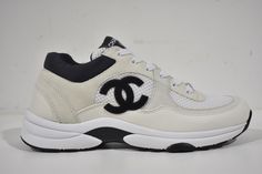 Chanel REV White Black CC Logo Leather Lace Up Flat Runner Trainer Sneaker 40 ********** Chanel ********** Brand: Chanel Size: 40 (know your Chanel size) Name: Trainer Color: White & Black Style: REV Style#: G38299 Y55720 K3846 Material: Mesh, Suede Calfskin & Grained Calfskin Lace up tie front Chanel black CC side logo White suede calfskin material White grained calfskin leather material CC tongue logo Large CC bottom logo *** SOLD OUT SUPER RARE *** Brand new in box, comes with original box and dust bag 100% Authentic or your money back Great gift I ship worldwide Any other questions just ask, I will be happy to answer them eBay store powered by Shopping Feed. Chanel Kids, Chanel Trainers, Chanel Sneakers, Chanel Brand, Shoes Outfit Fashion, Fresh Shoes, Trainer Sneakers, Chanel Black, Shopping Items