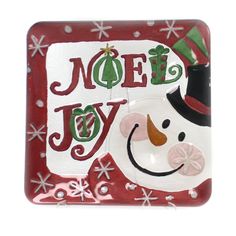 a red and white plate with a snowman on it that says noely joy