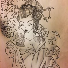 a drawing of a geisha woman holding a fan in her hand with flowers on it