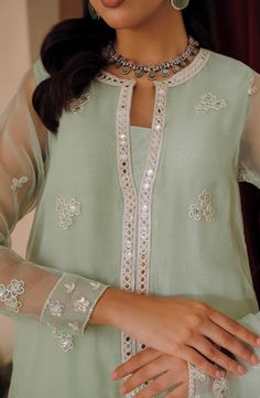 2 Piece Embroidered Suit for Women (SHIRT & DUPATTA) FABRIC: ORGANZA COLOR: GREEN WORK DETAILS: EMBROIDERED Description SHIRT: Style a-line Fabric organza Front embroidered, back plain dyed Neckline embroidered Sleeves embroidered DUPATTA: Organza sequin embroidered dupatta Green Straight Kurta Sets With Embroidered Neckline, Spring Pista Green Kurta With Mirror Work, Fitted Straight Kurta Set With Embroidered Neckline, Festive Green Kurta With Embroidered Neckline, Festive Green Dress With Embroidered Neckline, Green Straight Kurta Dress With Embroidered Neckline, Green Embroidered Neckline Straight Kurta Dress, Green Straight Kurta With Embroidered Neckline, Green Sets With Embroidered Neckline