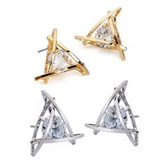 Totally unique and sure to capture attention. Interlocking lines form fashionable 3D cages for the sparkly 8mm crystals. A bold look for bold styles. Available in silver or gold tone.Materials: Alloy, crystalsSize: Triangle: 2cm (.75inch)Comes gift boxed(Reg $29.99) Normal Body Temperature, Earrings Triangle, Earrings Geometric, Triangle Earrings, Cz Earrings, Modern Earrings, Green Camo, Chevron Pattern, Sale Event