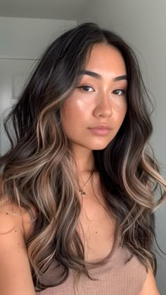 Looking to add a modern touch to your dark locks? Consider trying subtle balayage on black hair for a gorgeous transformation. This coloring technique creates a sense of depth and dimension, complementing your natural color beautifully. Whether you prefer soft highlights or more gradual transitions, balayage is a versatile option that can enhance your look in an understated yet striking way. Why not give it a try? Hair Color Ideas For Black Hair Balayage, Soft Dark Balayage, Balayage On Long Black Hair, Soft Brown Balayage Subtle Highlights, Highlighted Hair For Black Hair, Soft Balayage Black Hair, Dark Down Hair With Highlights, Subtle Hair Highlights For Black Hair, Hair Color Ideas For Brunettes Long