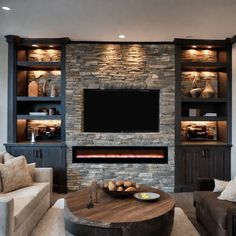 a living room filled with furniture and a flat screen tv mounted on the wall above a fireplace