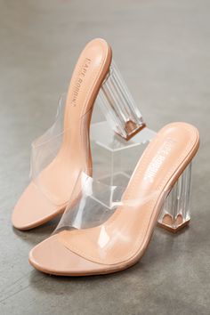 Faux leather Slightly cushioned insole Clear plastic strap Block heel Imported Shaft: 3" Heel: 4.5"   Product measured on a size 8 Block Heels Transparent, Pico Dulce, Heels Clear, Faux Leather Outfits, Pencil Heels, Clear High Heels, Transparent Heels, Footwear Design, Plastic Heels