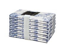 a stack of folded blue and white napkins