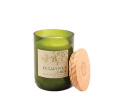 a green candle with a wooden lid next to it on a white background, the candle has a label that reads vera lemongrass