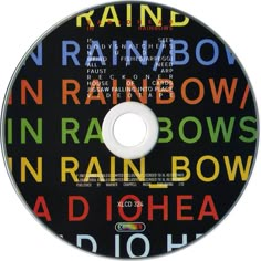 a cd disc with the words rainbow on it's front and back cover in multicolored letters