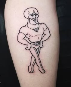 a man's leg with a tattoo on it that has a drawing of a wrestler