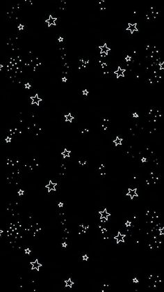 white stars are scattered on a black background