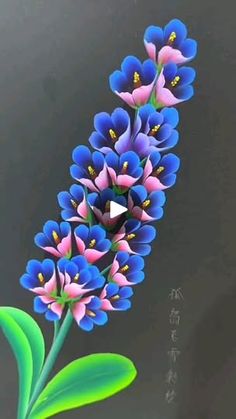 a painting of blue and pink flowers with chinese writing on the bottom right hand corner