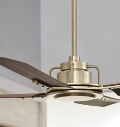 a ceiling fan with two blades attached to it