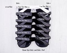 six pairs of black sunglasses with white labels on them