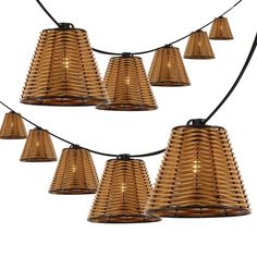 a bunch of lights that are hanging from a string on a wall in the shape of a cone