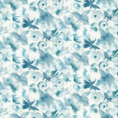 a blue and white flowered background with lots of flowers in the middle of it