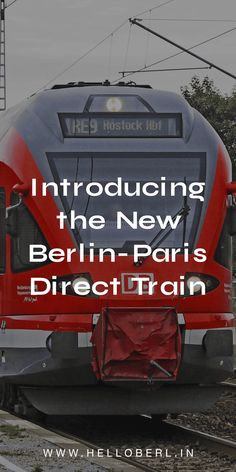 a red and gray train traveling down tracks with the words, including the new berlin paris direct